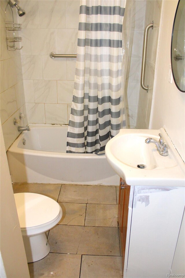 1629 Seminole St, Flint, MI 48503 - bathroom with shower / bath combo with shower curtain, tile patterned flooring, and vanity