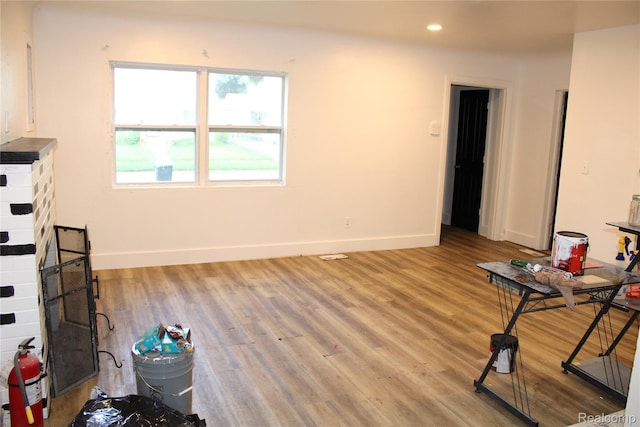 1629 Seminole St, Flint, MI 48503 - unfurnished living room with light wood-style flooring and recessed lighting