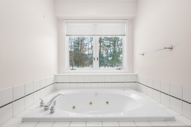 bathroom with a jetted tub