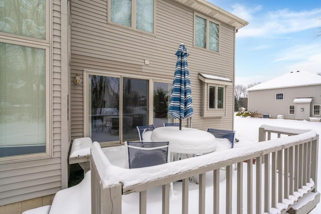 view of snow covered deck