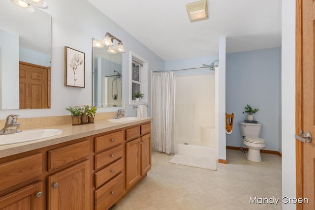 full bath featuring a sink, toilet, and curtained shower