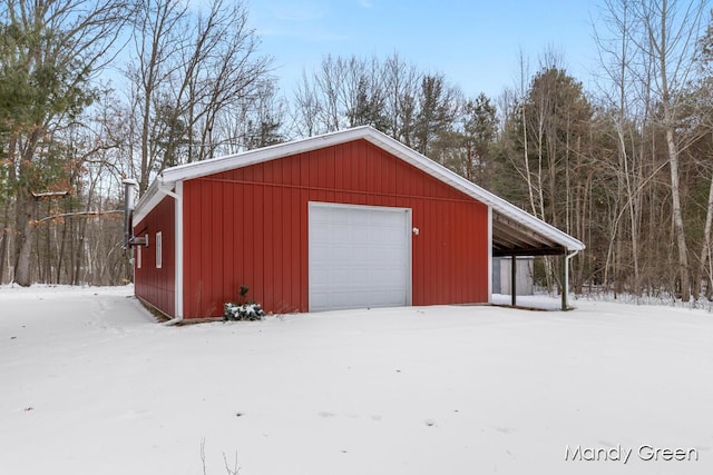 snow covered structure with an outdoor structure