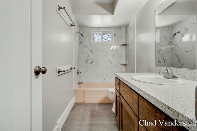 bathroom with baseboards, vanity, toilet, and shower / tub combination