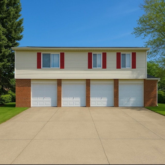 51116 S Foster Rd, Chesterfield, MI 48047 - view of front of property featuring brick siding and a garage