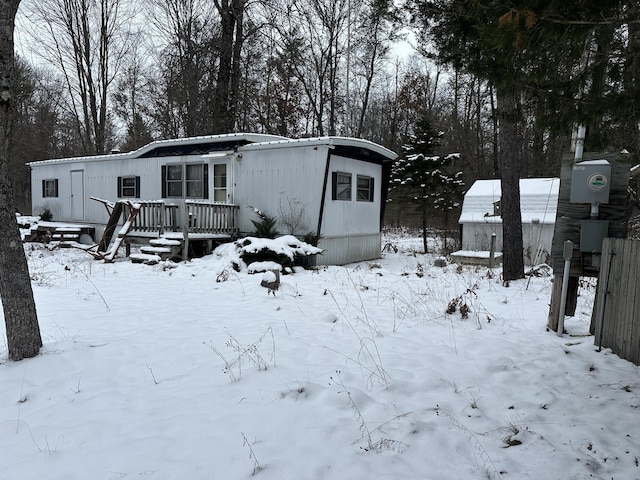 view of front of property featuring a deck