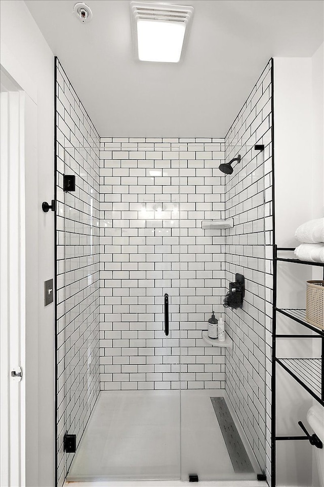 full bathroom with a stall shower