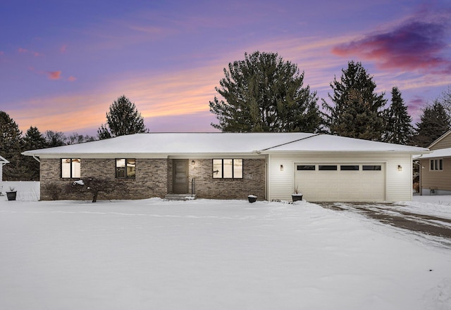 single story home with a garage