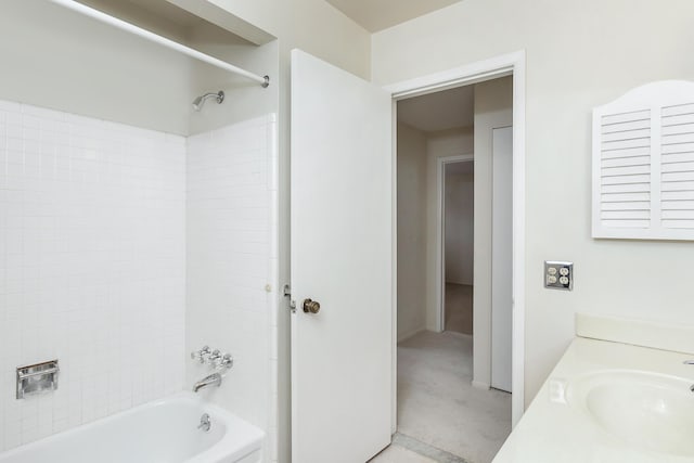 bathroom featuring vanity and bathing tub / shower combination