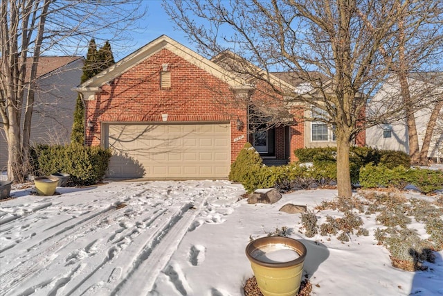 view of front of home featuring brick siding and an attached garage