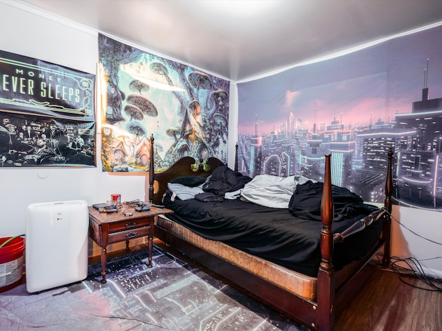 bedroom with wood finished floors