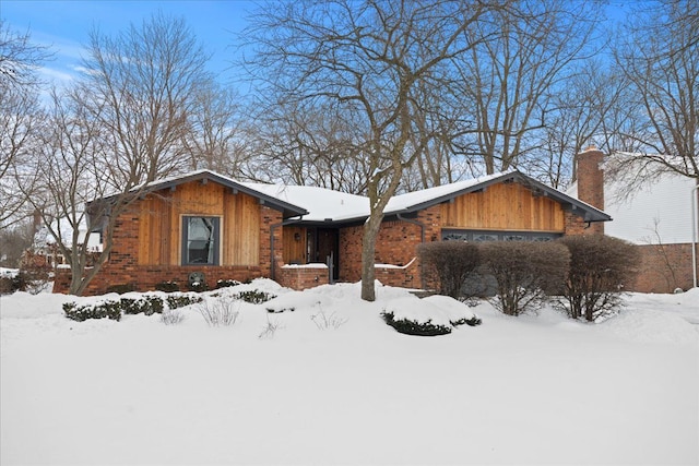 view of snow covered property