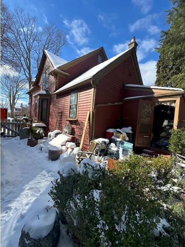 view of snow covered property