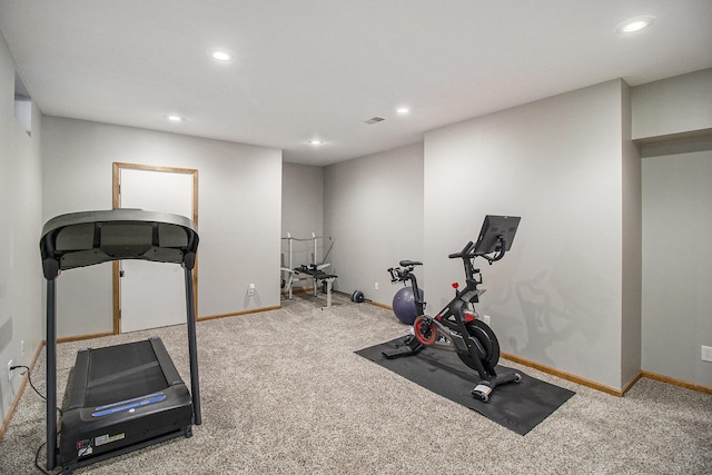 exercise room featuring baseboards, carpet flooring, and recessed lighting