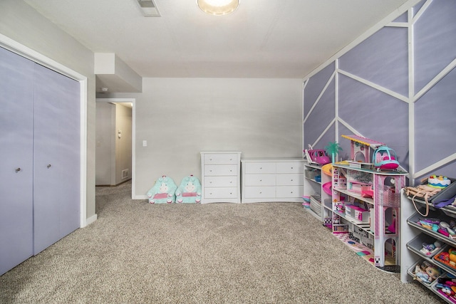 playroom with carpet floors and visible vents