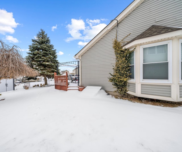 view of snow covered property