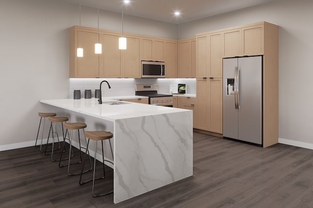 1760 E Auburn Rd Unit 202, Rochester Hills, MI 48307 - kitchen featuring appliances with stainless steel finishes, a sink, a peninsula, light brown cabinetry, and tasteful backsplash