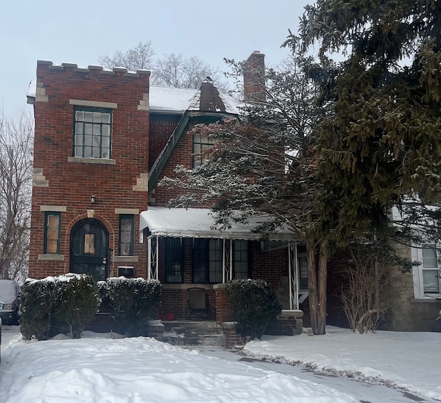 view of front of home with brick siding