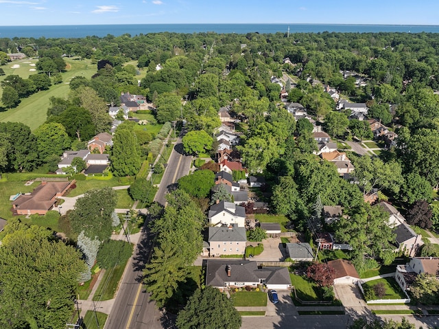 aerial view featuring a residential view and a view of trees