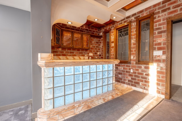 bar featuring recessed lighting, carpet flooring, and brick wall