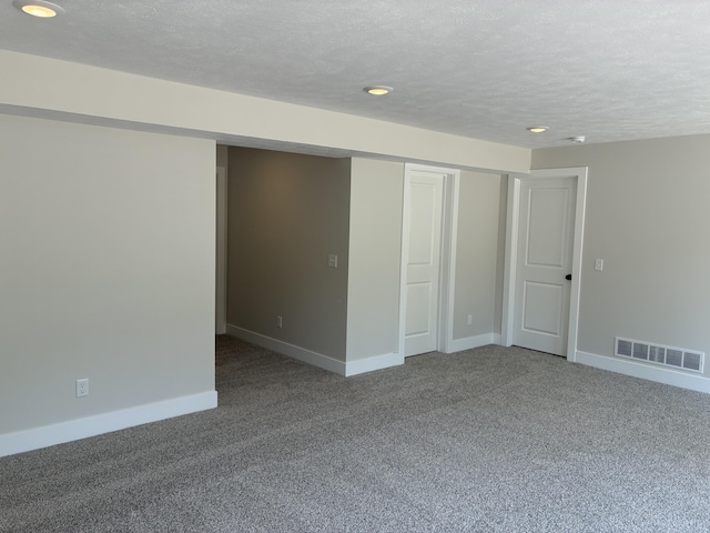 1973 Lowe Dr, Spring Lake, MI 49456 - basement featuring carpet floors, a textured ceiling, and recessed lighting