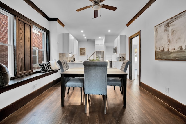 dining area featuring dark wood-style floors, recessed lighting, stairway, and baseboards