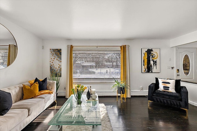 living room with a baseboard radiator, dark wood finished floors, and baseboards