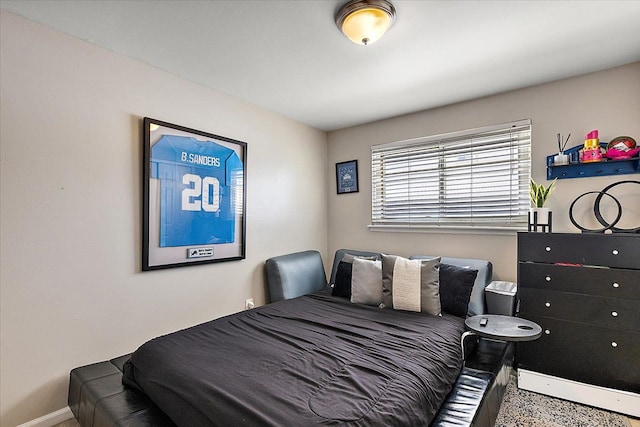 bedroom featuring baseboards