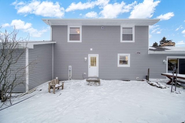 view of snow covered property