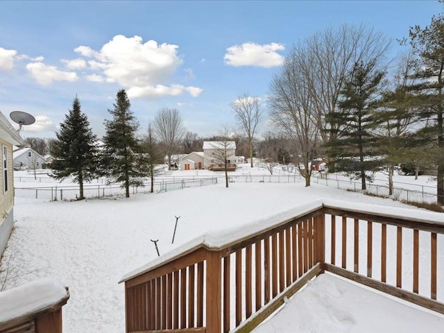 view of snow covered deck