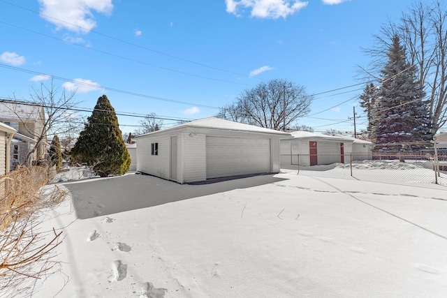 view of outbuilding with an outbuilding and fence