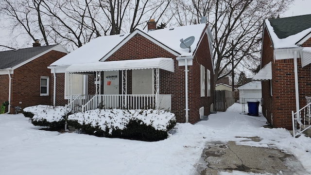 bungalow with brick siding