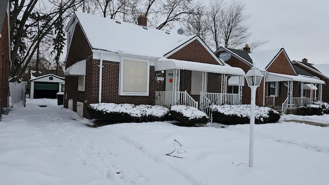 bungalow-style house featuring brick siding