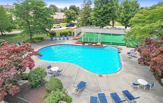 community pool with fence