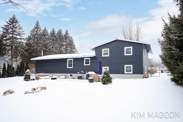 view of snow covered house