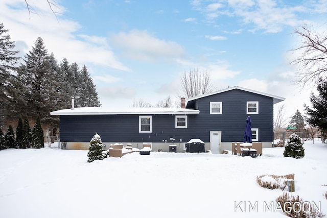 view of snow covered property