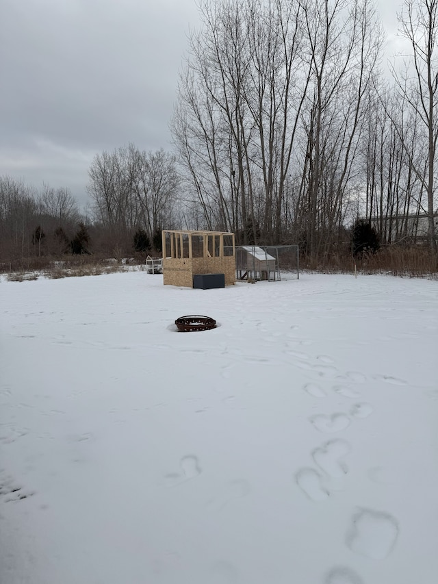 view of yard covered in snow