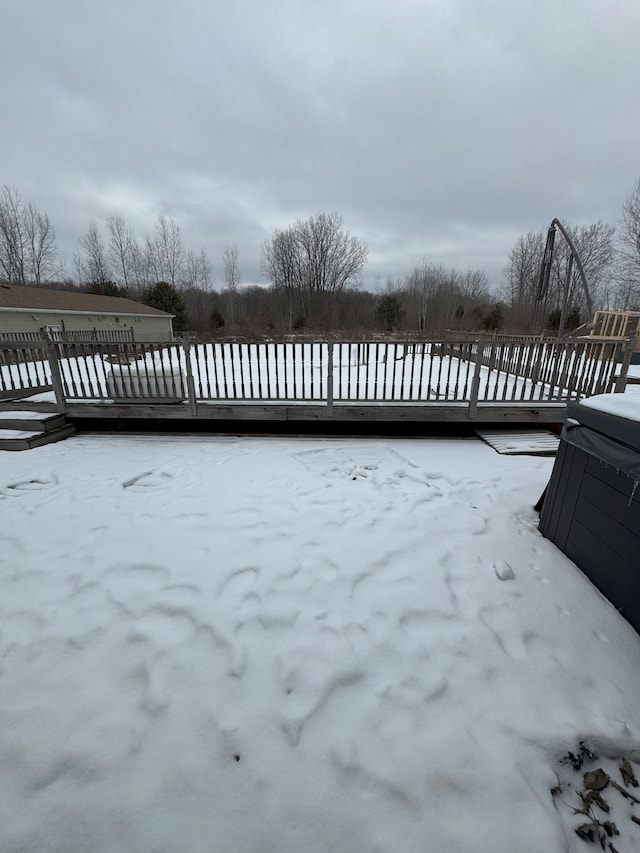 view of snow covered deck