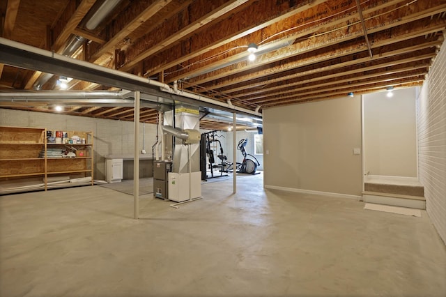 unfinished basement with heating unit