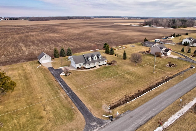 birds eye view of property featuring a rural view