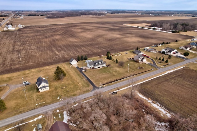 birds eye view of property featuring a rural view