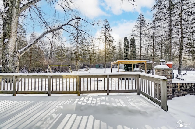 view of snow covered deck