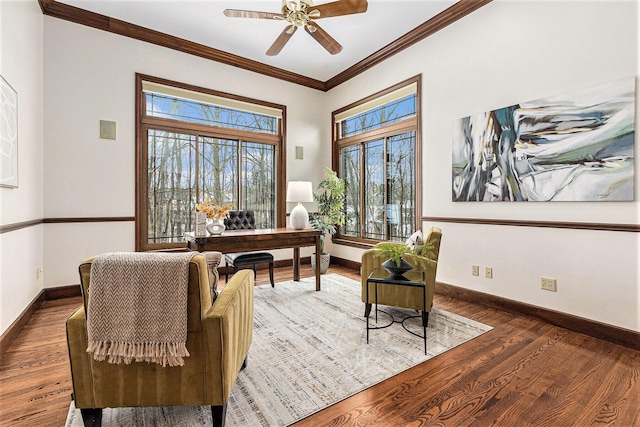 office area with baseboards, dark wood finished floors, a ceiling fan, and crown molding