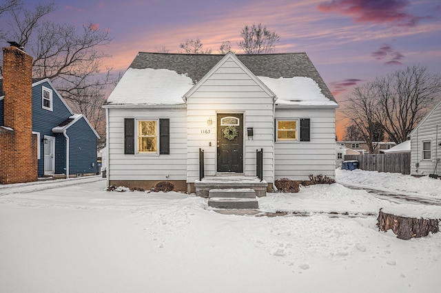 bungalow with roof with shingles