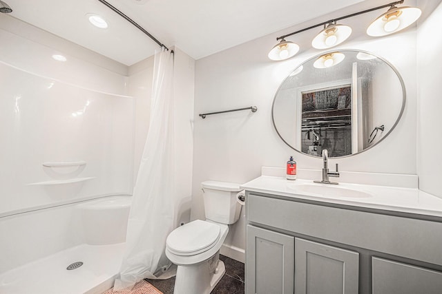 full bath with curtained shower, vanity, and toilet