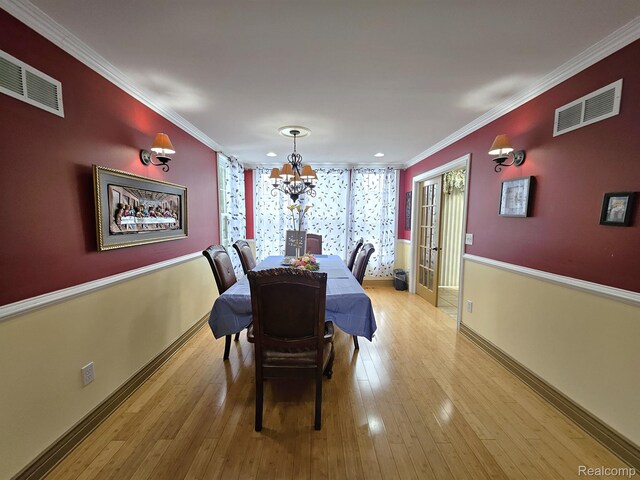 45 Forthton Dr, Troy, MI 48084 - dining room with a chandelier, light wood-style floors, ornamental molding, and recessed lighting