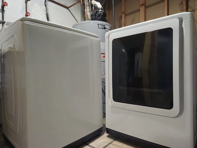 washroom featuring laundry area and washer / clothes dryer