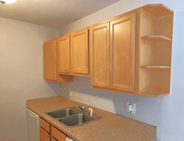 kitchen featuring light brown cabinetry, white dishwasher, a sink, and open shelves