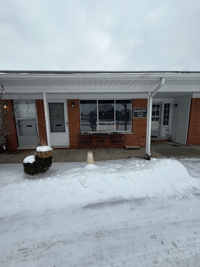 view of front of property with brick siding