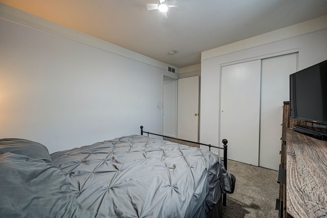 bedroom featuring carpet, a closet, and visible vents