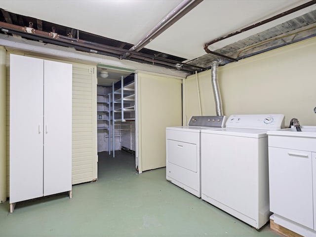 clothes washing area featuring laundry area and independent washer and dryer